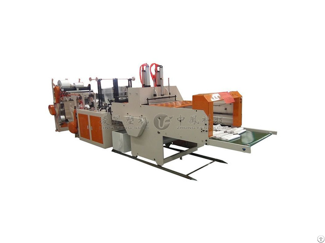 Full Automatic Four Roll Feeder Double Lines Cold Cutting T Shirt Bag Making Machine Supplier