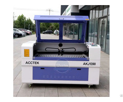 Widely Used Two Heads Fabric Paper Mdf Co2 Laser Engraving Cutting Machine For Making Clothes